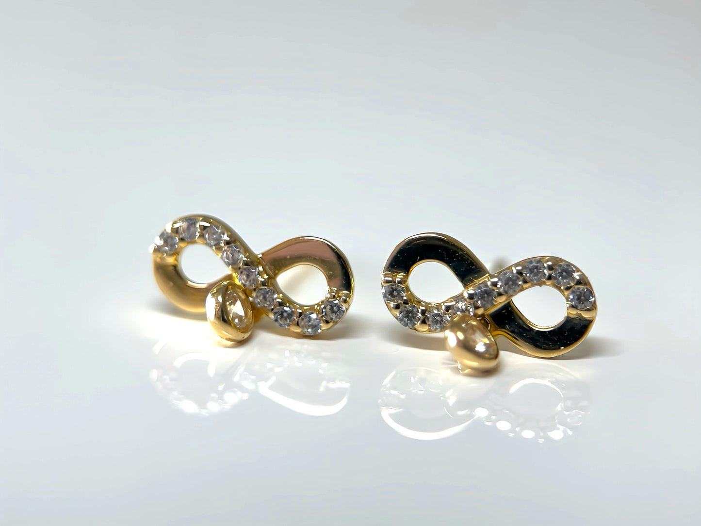 Infinity zirconia stud earrings